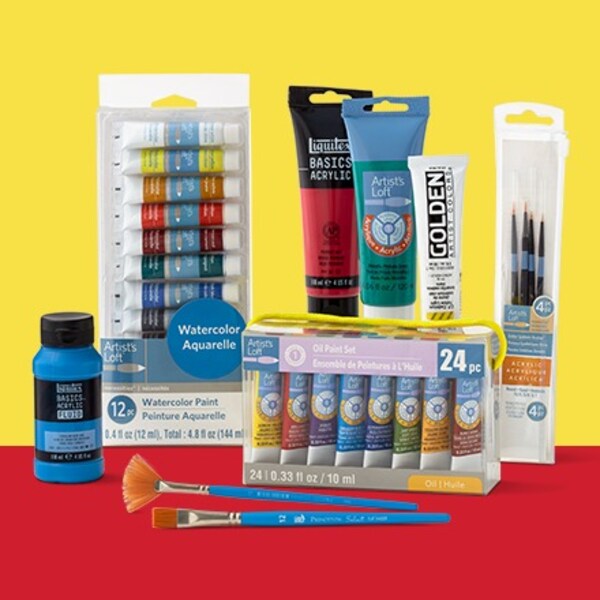 paint sets and brush sets on yellow and red background